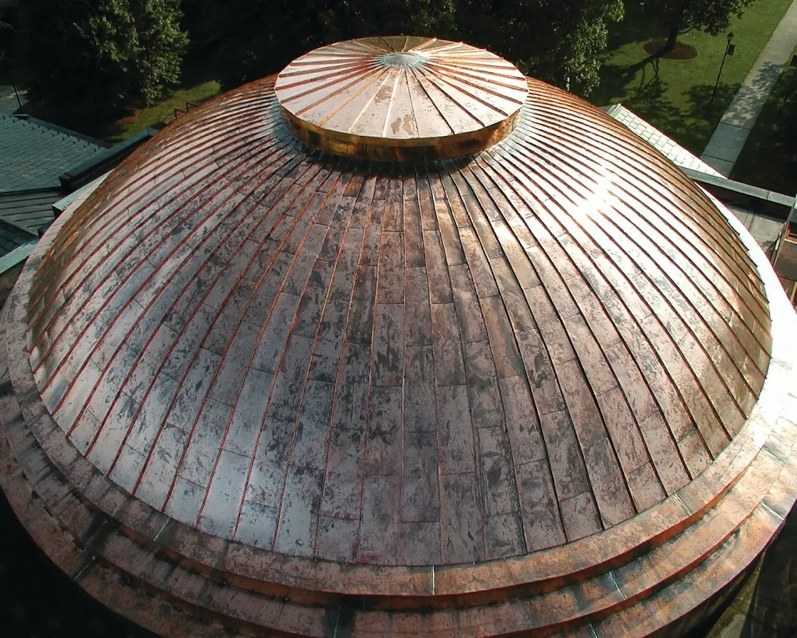 Craftsman Roofing crew installing a new roof in Cushing Square